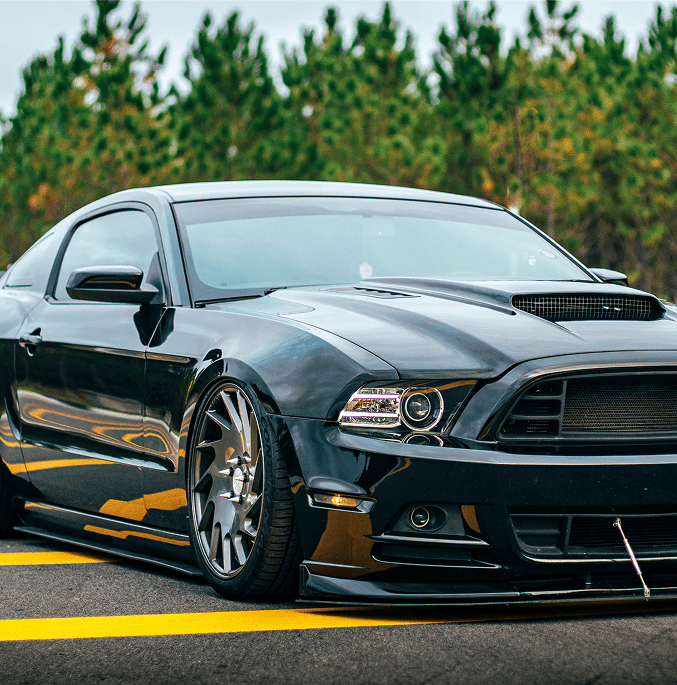 Black sports car with shiny rims